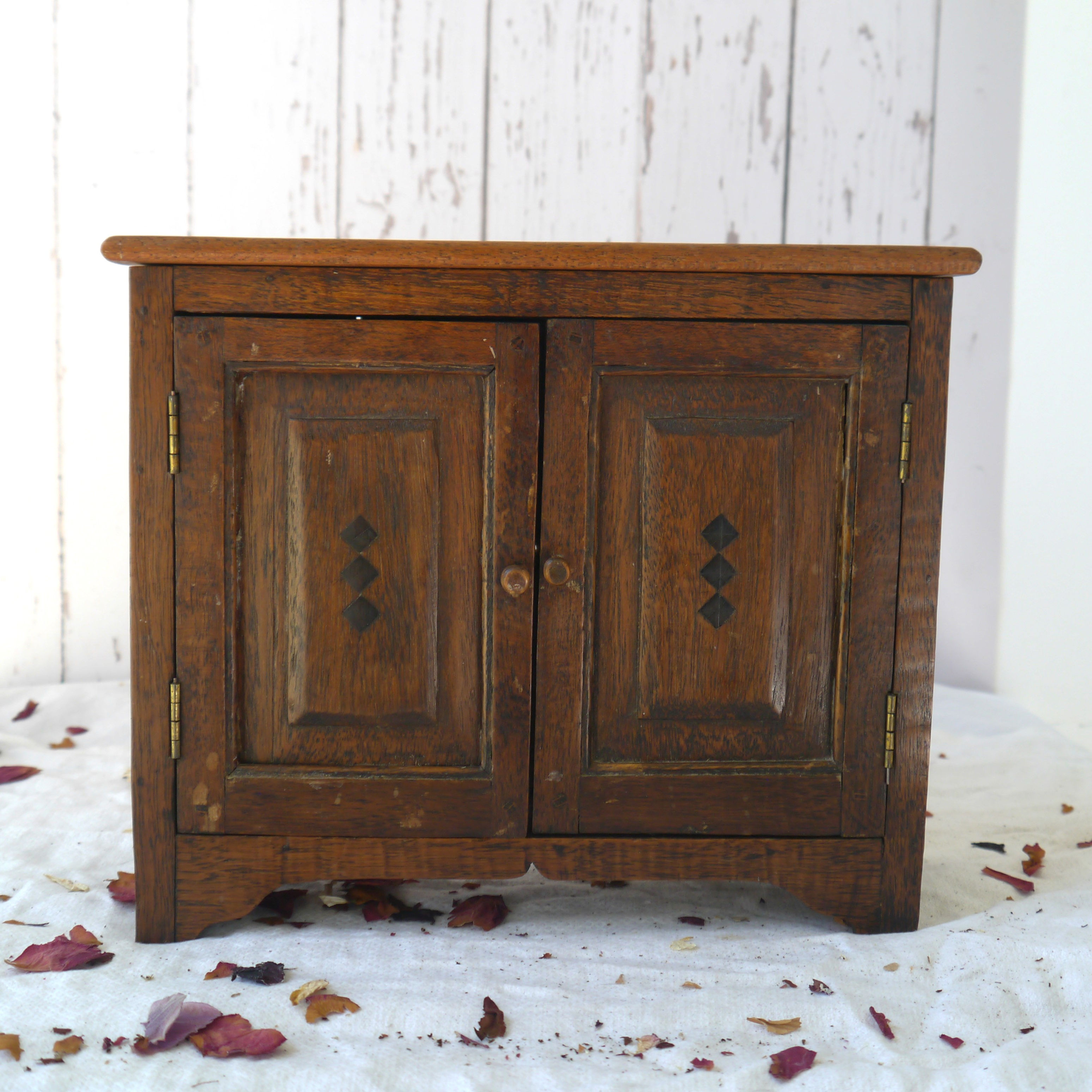 Small wooden vintage apprentice cabinet with internal drawers