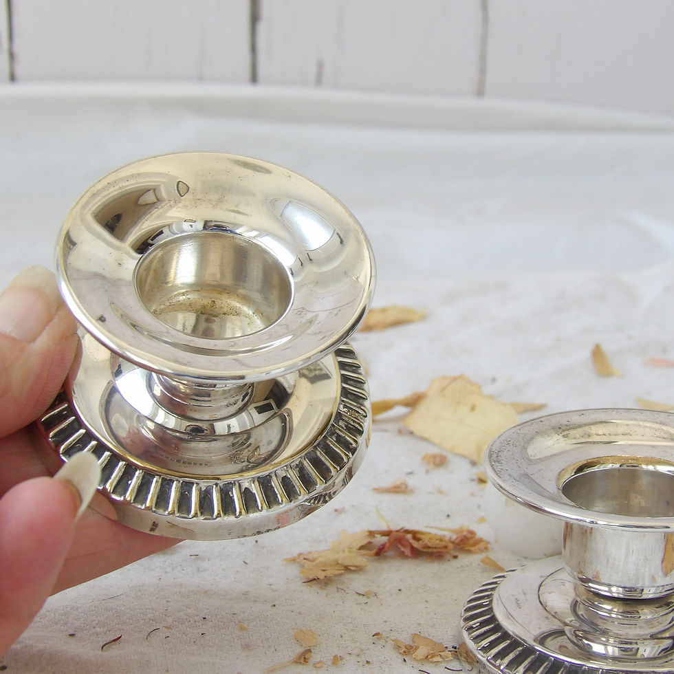 Thumbnail: A pair of dwarf vintage silverplate candle holders