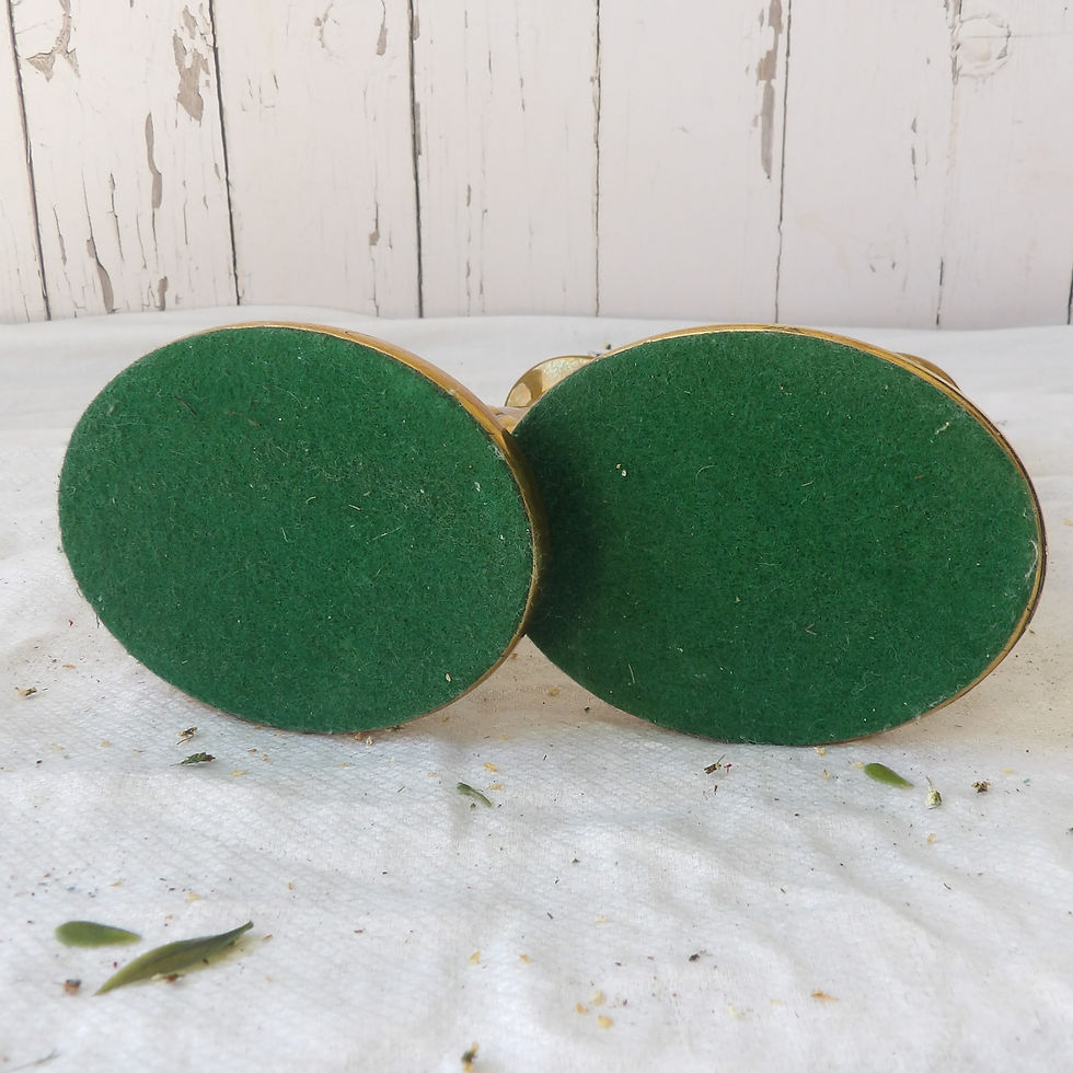 Thumbnail: a pair of decorative brass candle holders