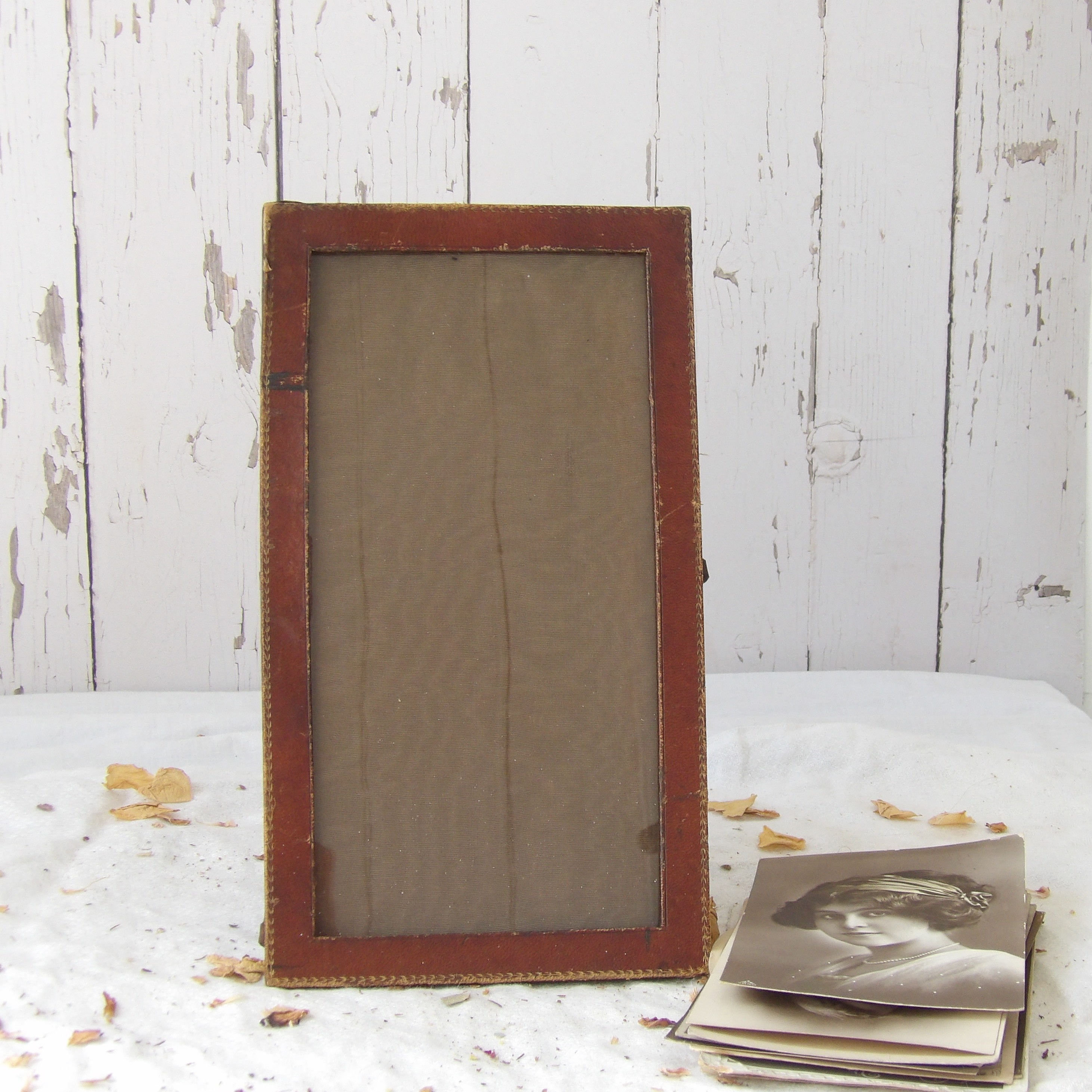 antique portrait leather photo frame with gold motifs
