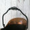 Thumbnail: Antique copper helmet shaped coal bucket in wrought iron feet