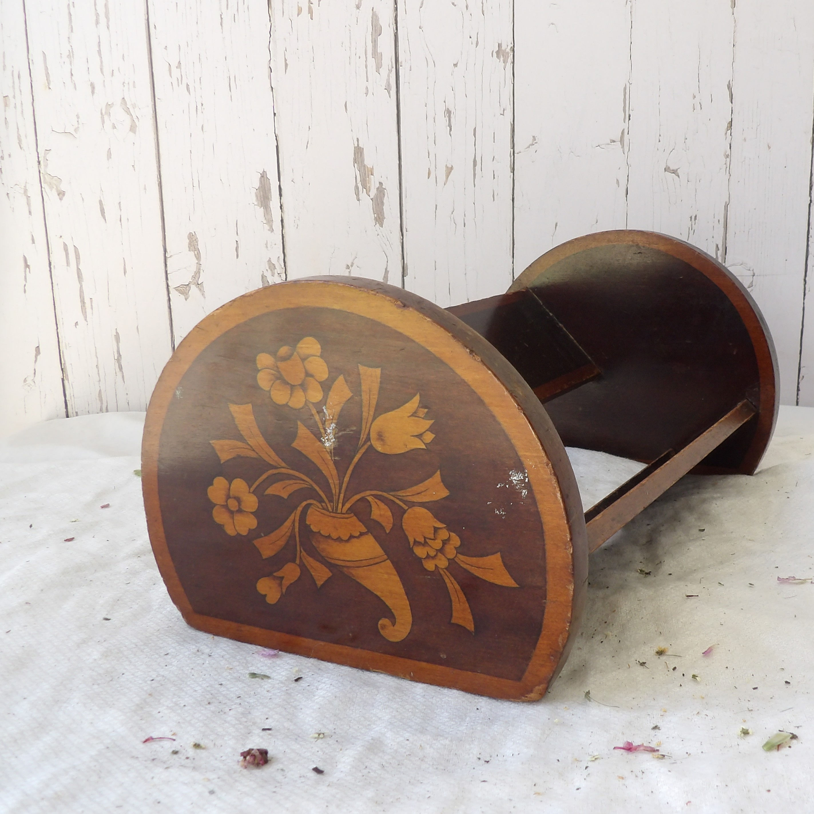 small vintage wooden book rack with flower picture ends