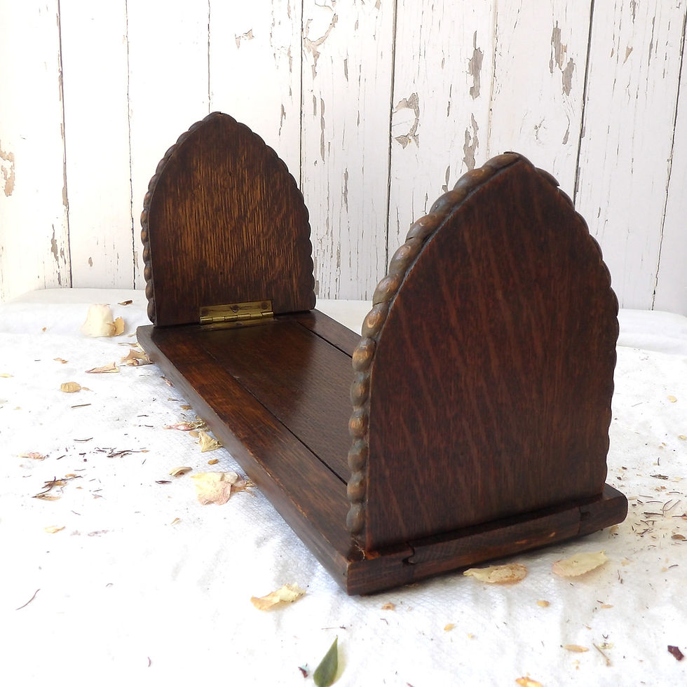 antique oak extending bookshelf with carved ends