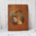antique child's painted portrait on wood