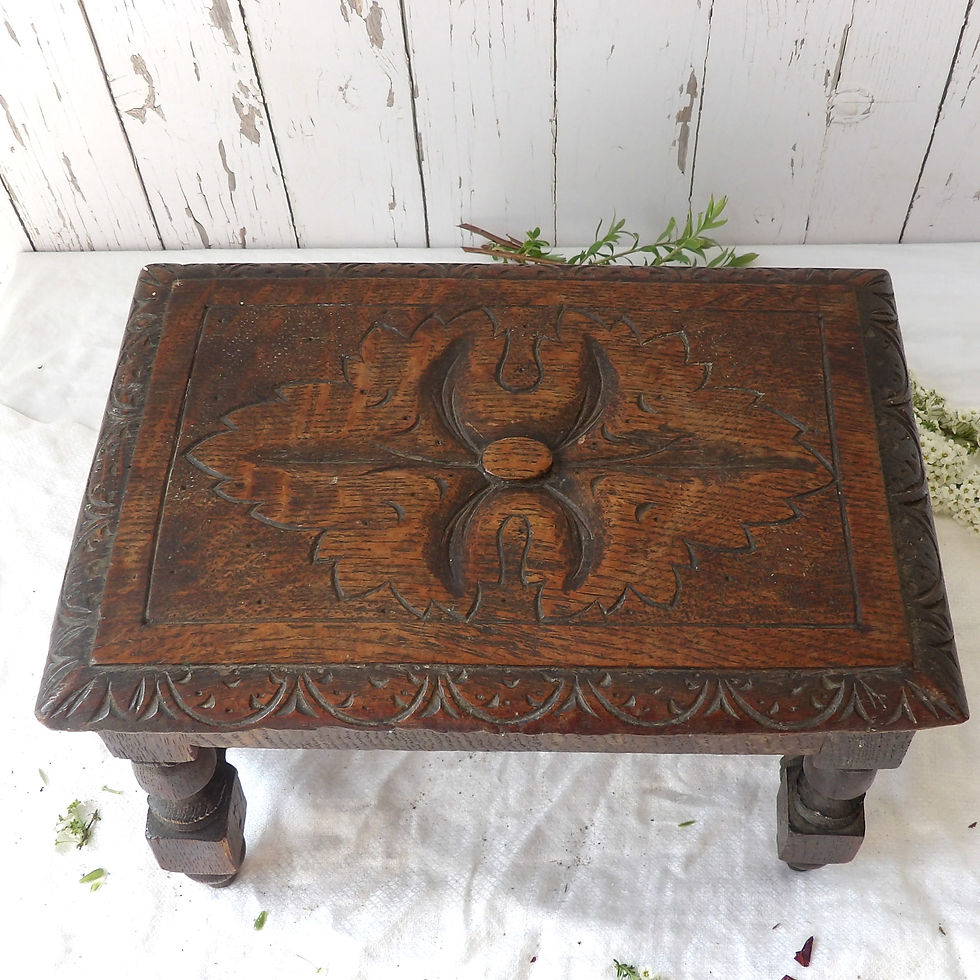 Thumbnail: antique carved wooden stool with turned legs