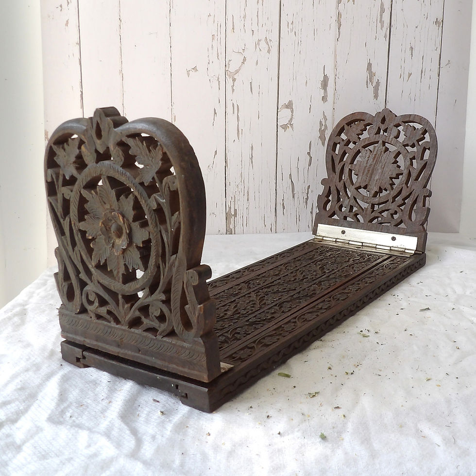 Thumbnail: vintage carved wooden bookshelf with floral design