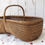Thumbnail: small vintage woven basket with bent wood handle