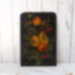 Antique floral painting on lacquered slate