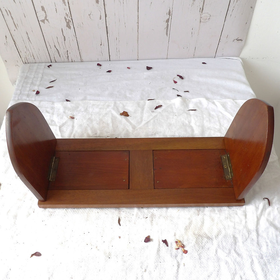 antique folding bookshelf with decorative ends