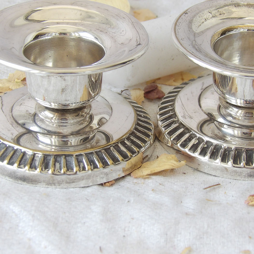 Thumbnail: A pair of dwarf vintage silverplate candle holders