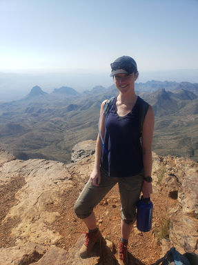 Melissa in front of mountains