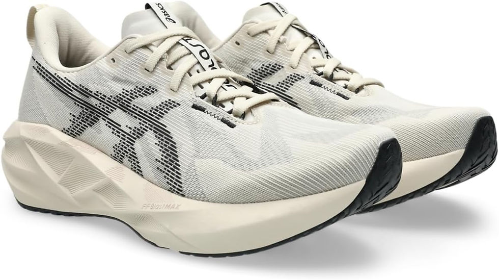 Pair of cream ASICS running shoes with black accents and FF BLAST MAX on a white background.