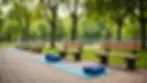 Outdoor exercise area with yoga mats and benches