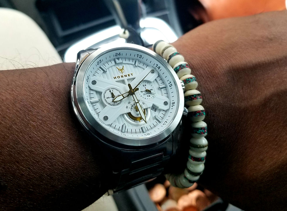 WOTD wrist shot of the Moto-Time, Hornet Chronograph, accessorized with a white Yak Bone beaded bracelet.