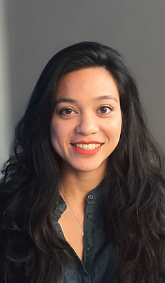 Smiling headshot of San Francisco yoga teacher Rowena Mittal, MS, PhD, CYT