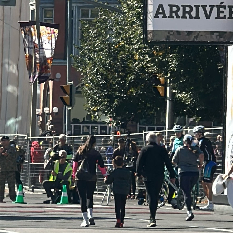 Family crossing the finish line.