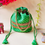 Thumbnail: Women Designer Green Lehariya Potli Bag with Pearl Handle and latkan