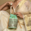 Thumbnail: Women Premium Designer Wedding Green Potli bags with Heavy Pearl Ha