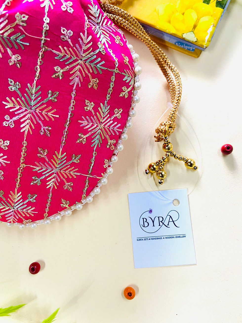 Thumbnail: Women Pink Floral Embroidered potli bag with Pearl handle and latka