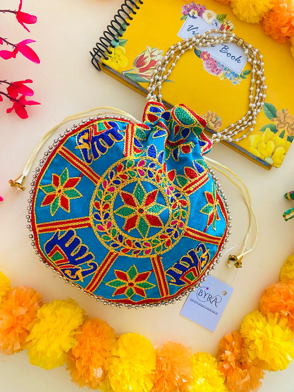 Handcrafted Firozi Potli Bag with Rajasthani Elephant Embroidery – Ethnic Traditional Accessory by Byra