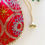 Thumbnail: Women Red Sunflower Embroidered Wedding Potli Bags with Pearl handle