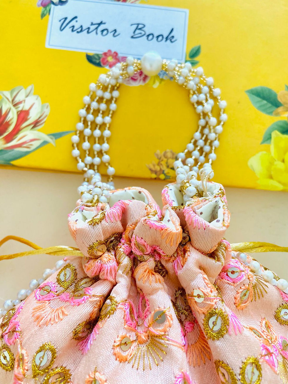 Thumbnail: Women Designer Sequins Floral Embroidered Potli Bags with Pearl Handle