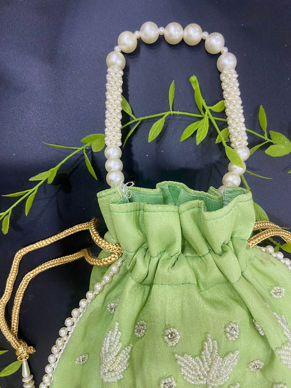 Thumbnail: Women Premium Pearl Hand Work Green Potli bag with Heavy Latkan and Pear