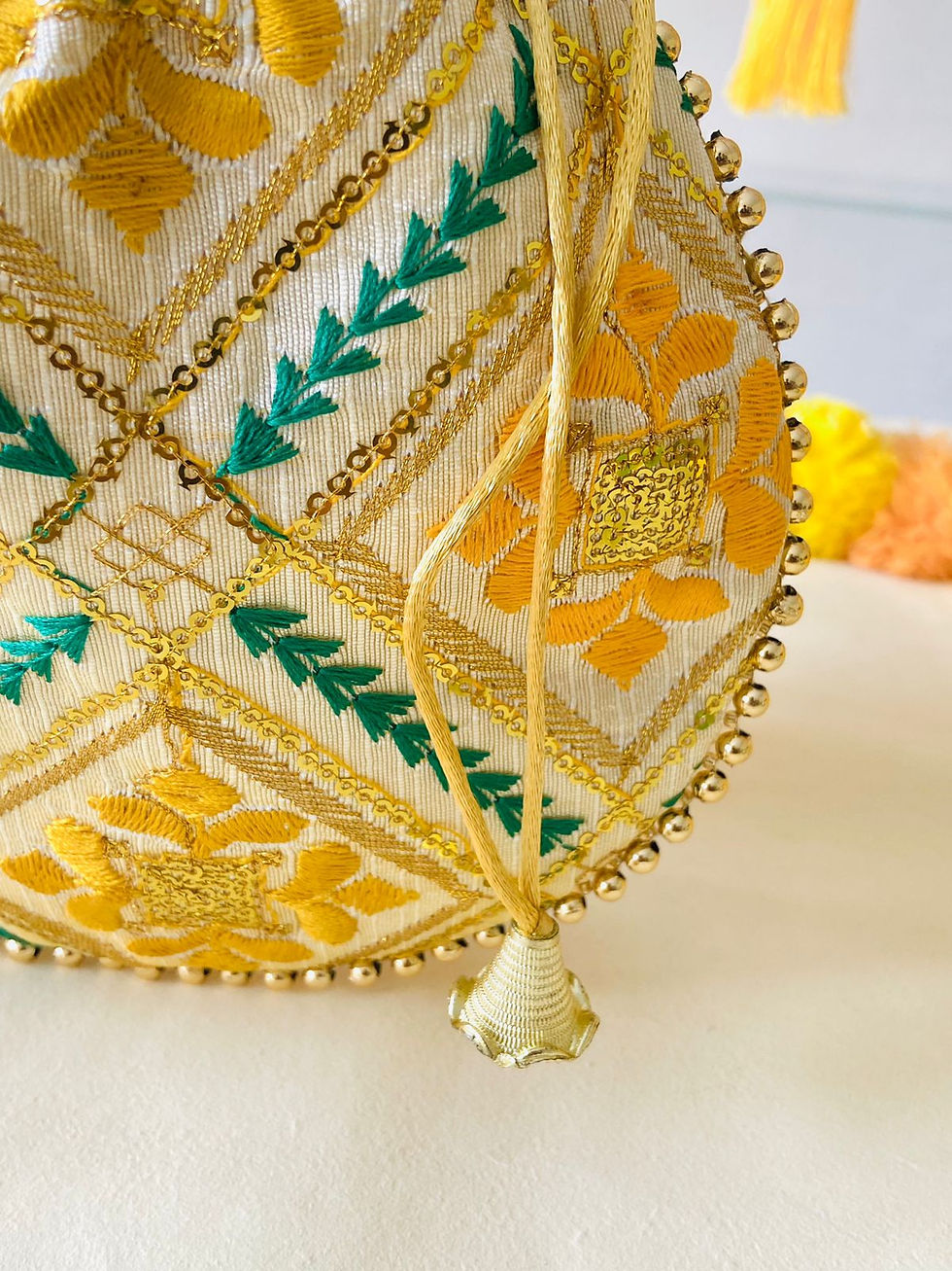 Thumbnail: Buy Yellow Embroidered Bridal Potli Bags – Designer Wedding Potli for Women | Byra Store