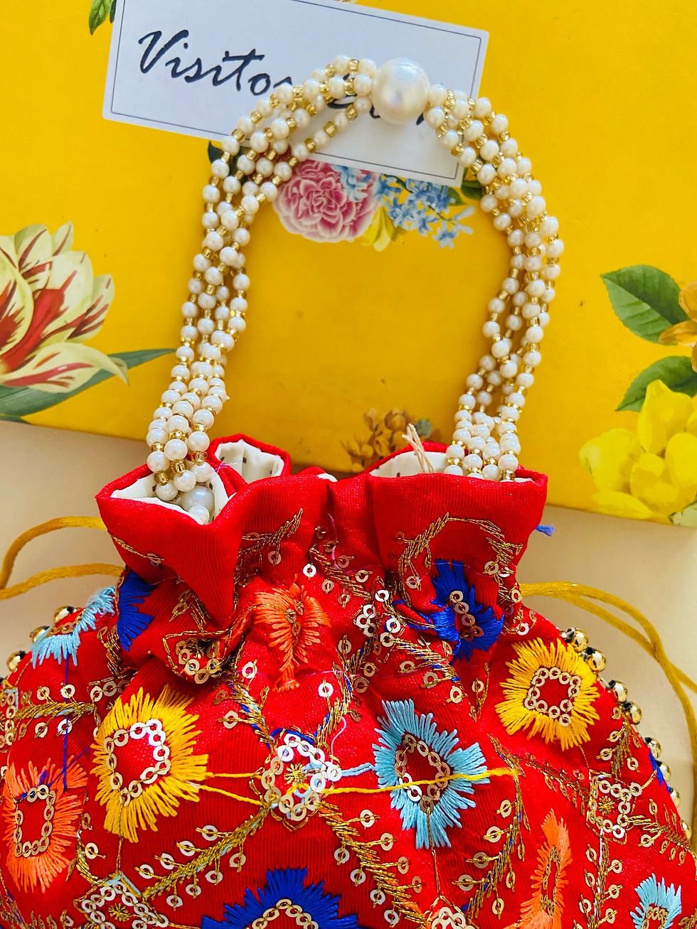 Thumbnail: Women Red Embroidered Designer Potli bag with Pearl Handle and latkan