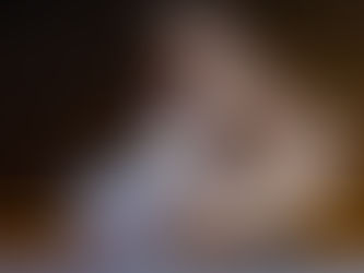 Event Photographer in Dubai capturing a dancer spinning on stage in a flowing white dress during a live cultural performance.