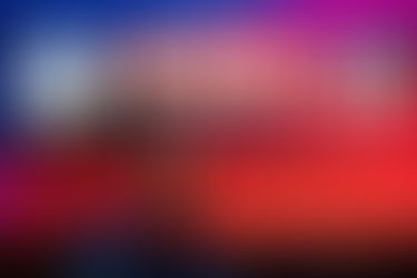 Corporate photos: keynote speaker in a suit on the RETAIL CONGRESS 2022 stage with a bold branded LED backdrop and audience silhouettes.