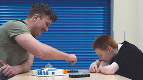 MCR Pathways mentor with young person