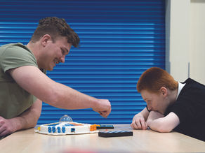 MCR Pathways mentor with young person