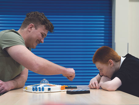 MCR Pathways mentor with young person