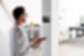 person-using-a-smartphone-in-his-automated-home.jpg