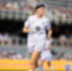 Bethany Balcer playing soccer in the NWSL
