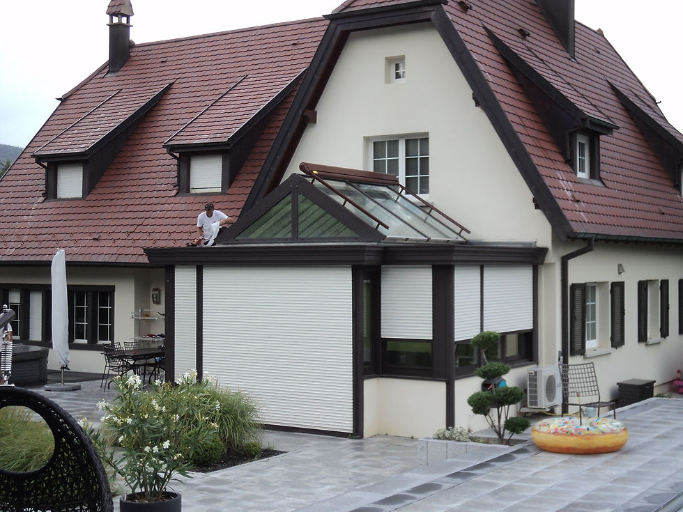 Veranda toit plat avec puit de lumière