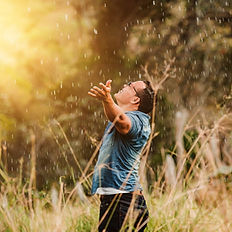 Man in field receiving loving energy