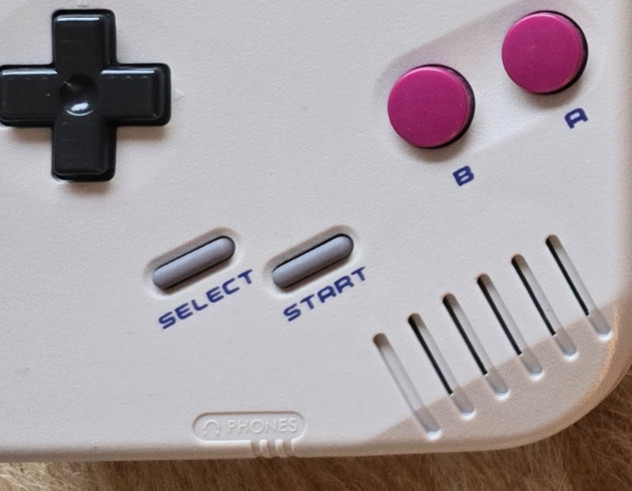 Game Boy DMG-01 mono speaker behind the front-shell grille