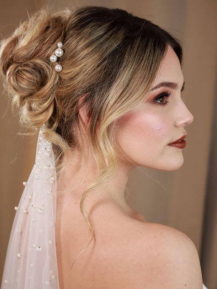 beautiful glamourous close up of a bride with striking make up b