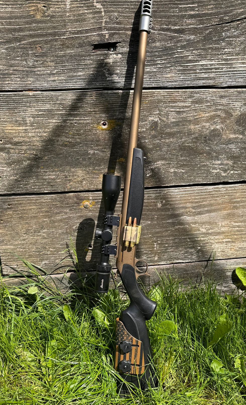 35 Whelen CVA Scout 25-inch heavy barrel with a twist rate of 1:12, installed a Witt Machine Custom Clamp-On Muzzle Brake, Burris Optics Fullfield E1 4.5-14x42mm scope, on the side of the rifle, Short Action Precision SAP two-round holder, Matthew's Fabrication adjustable cheek riser, custom Cerakote in burnt bronze.