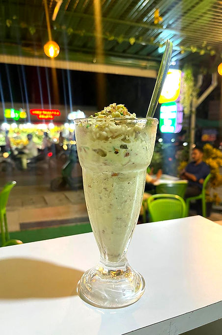 Classic avil milk drink from Momo Popz café, made with bananas, poha, and milk.