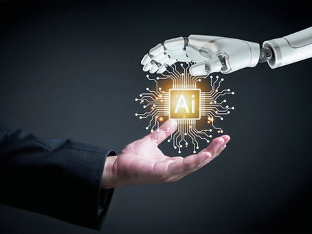 Eine menschliche Hand und eine Roboterhand berühren sich über einem leuchtenden AI-Symbol. Symbolbild für Ethik, Verantwortung und Bewusstsein im Umgang mit Künstlicher Intelligenz.