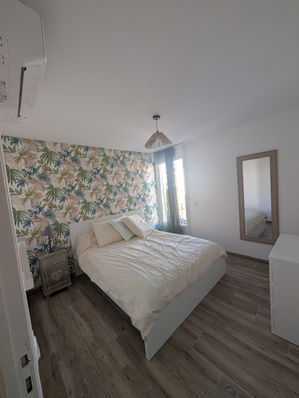 Chambre du projet location à Villeurbanne avec lit double.