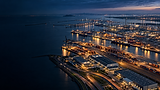 Aerial view of a lit port for physical security risk assessment.