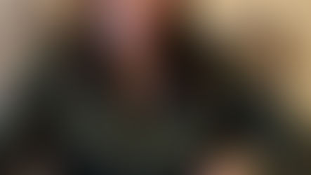 Juli Henderson signing contract with book agent, Embolden.