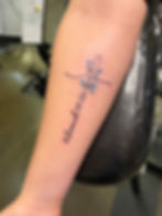 Cross with blue flowers