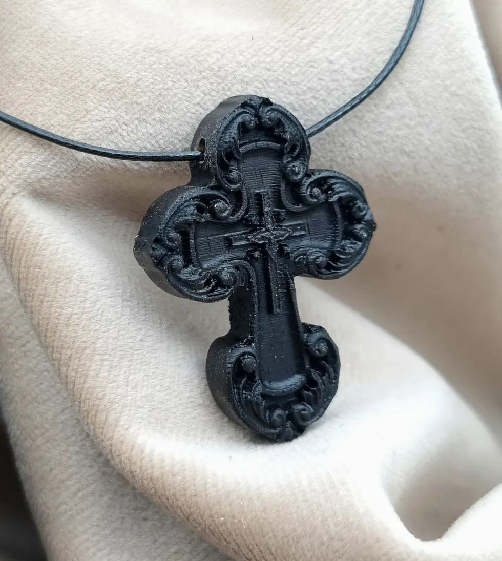 Ornate black cross pendant on a thin dark cord 43 Christian Shop