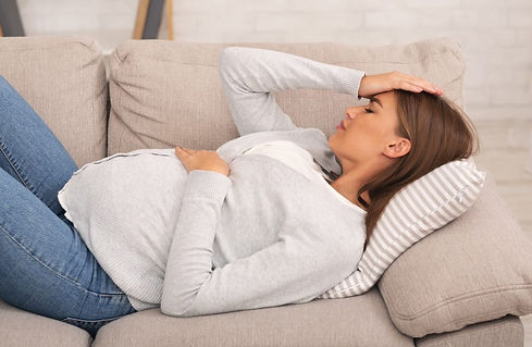 pregnant-woman-feeling-bad-lying-on-couch-at-home-1024x667.jpeg