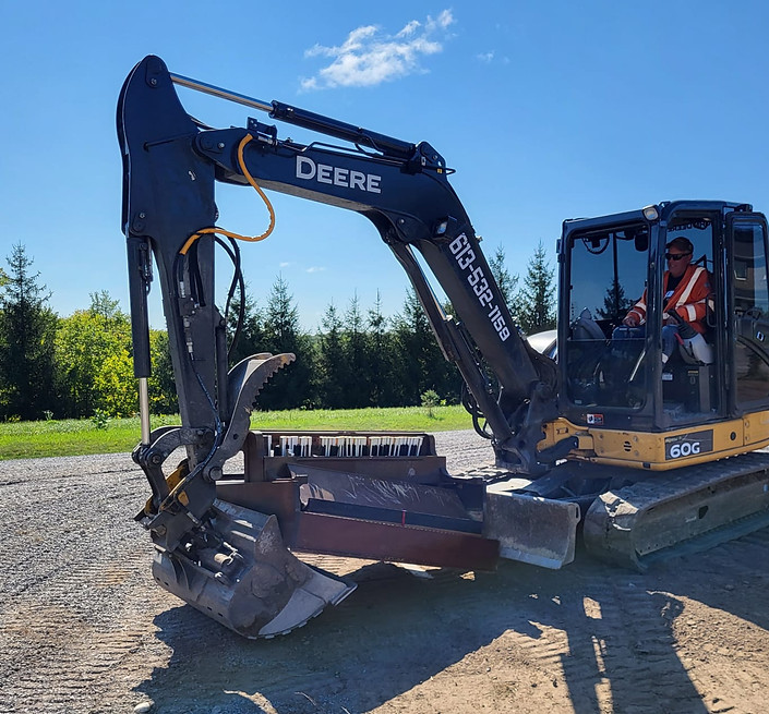 John Deere Excavator doing demolition
